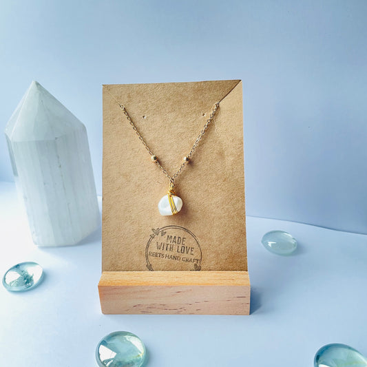 Wire wrapped pearl necklace