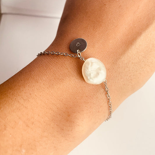 Silver Pearl Bracelet featuring a heart pendant